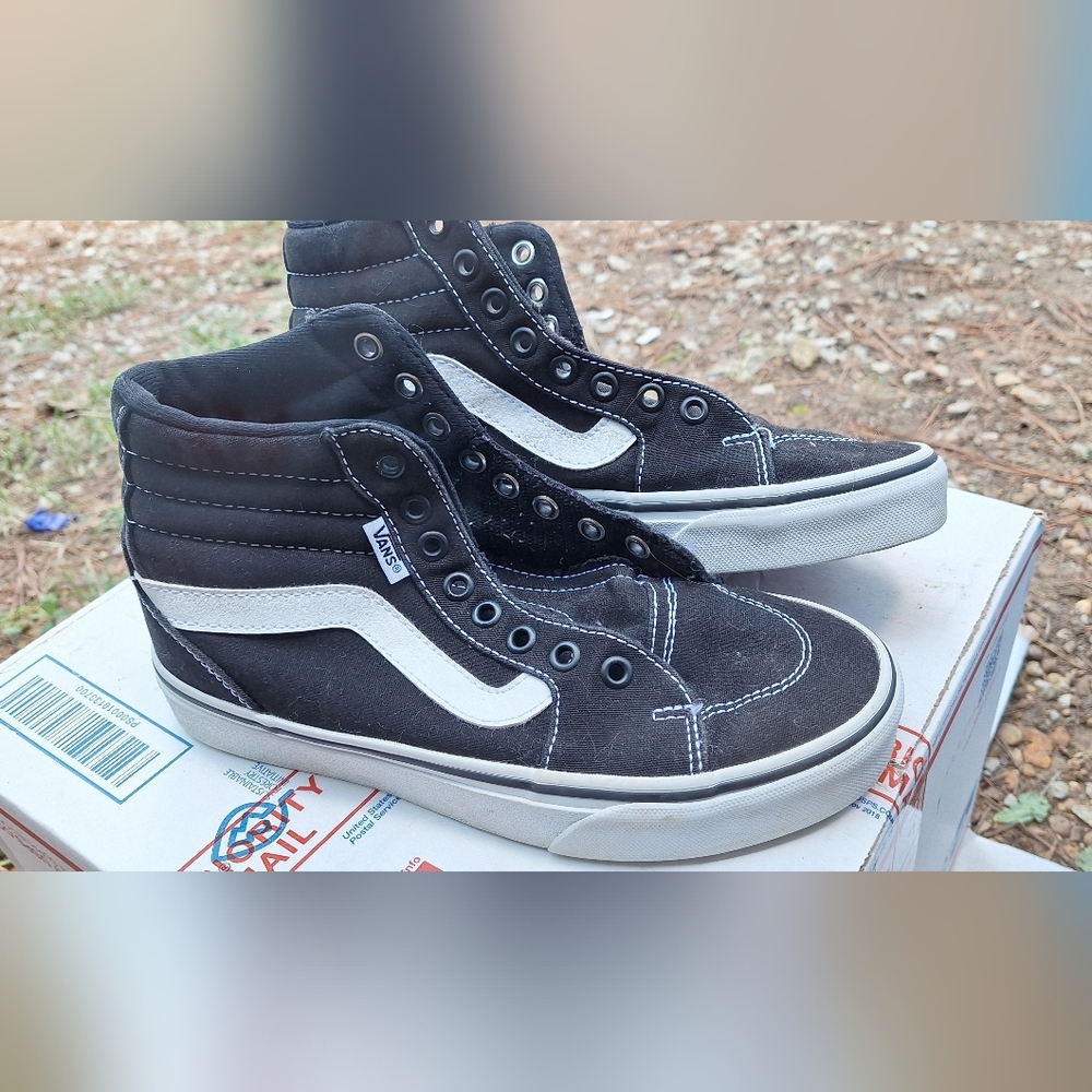 Vans Black and White High-Top Sneakers